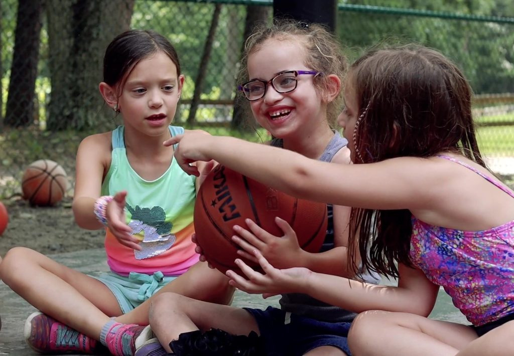 Girls passing ball